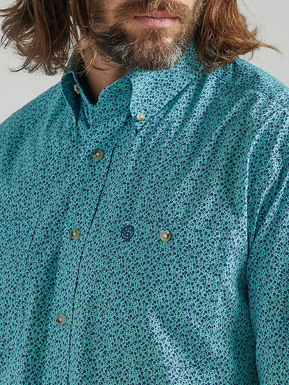 WRANGLER GEORGE STRAIT LONG SLEEVE TWO POCKET BUTTON DOWN PRINT SHIRT IN TEAL FLOWERS