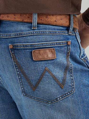 WRANGLER MEN'S RETRO SLIM FIT BOOTCUT JEAN IN TIMBER